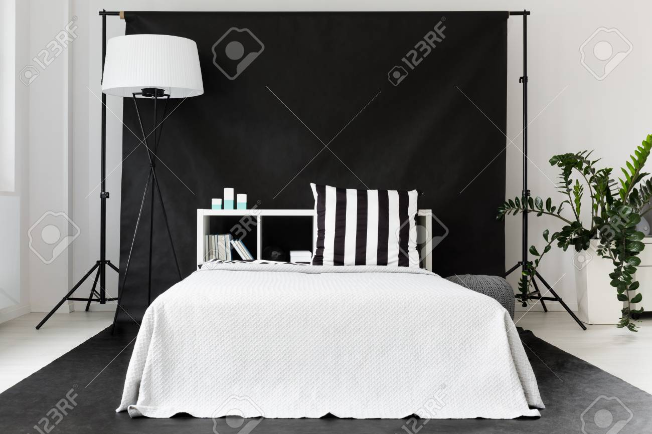 Modern Black And White Bedroom With Large Bed Floor Lamp And within dimensions 1300 X 866