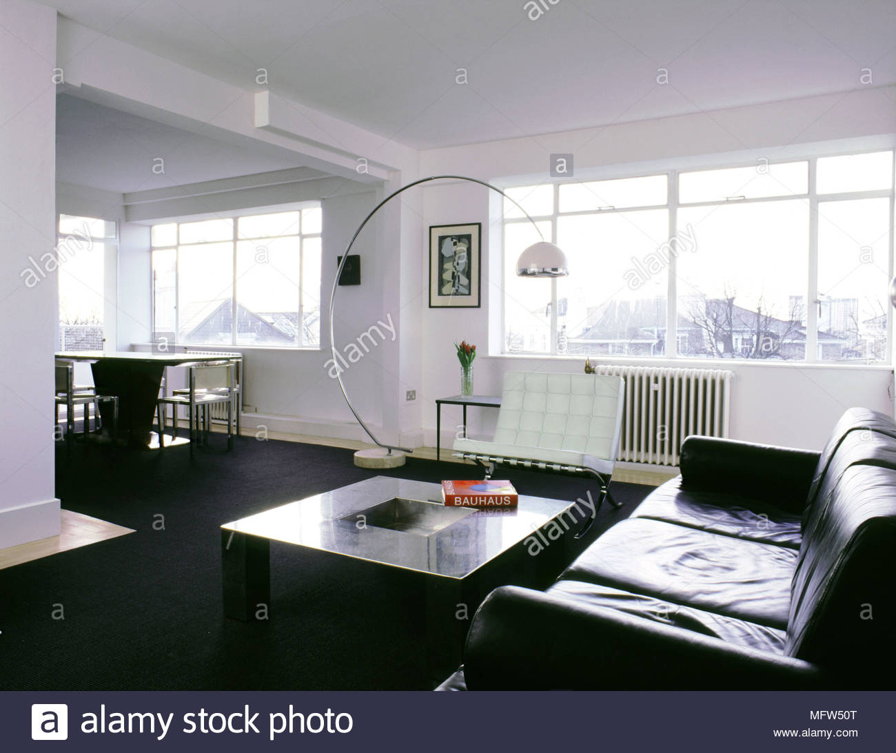 Modern Open Living Area With Black Carpet Dining Table And pertaining to size 1300 X 1093